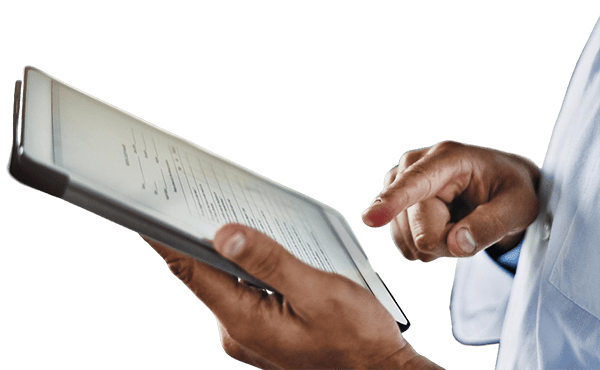 Healthcare professional reviewing integration workflows on a tablet